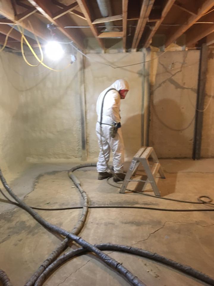 basement getting insulated with spray foam by foam tech